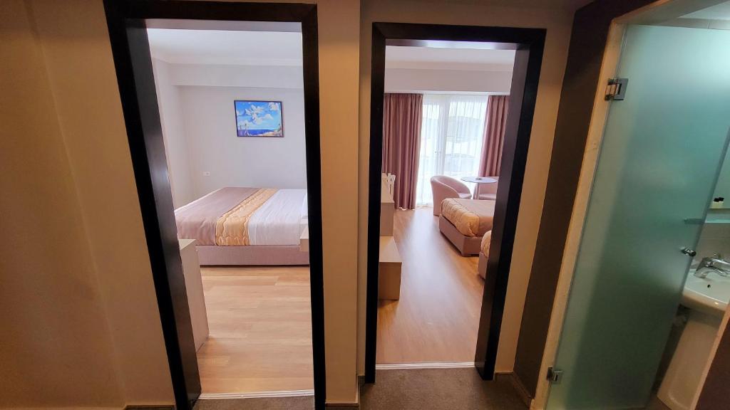 Voodi või voodid majutusasutuse Hotel Enkelana toas