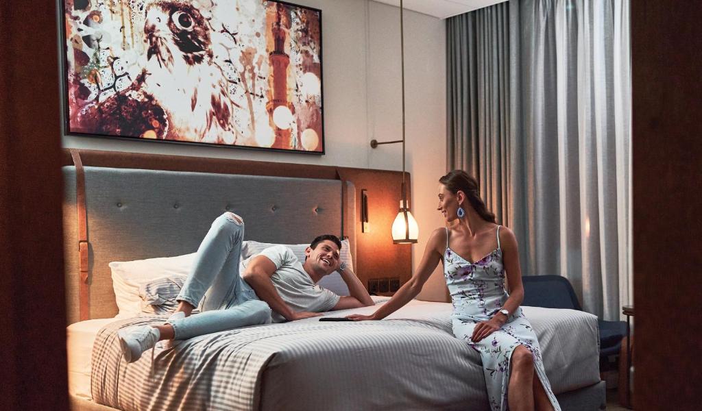 Postel nebo postele na pokoji v ubytování Revier Hotel - Dubai