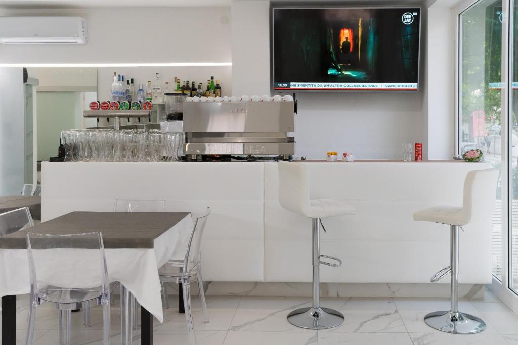Kuchyň nebo kuchyňský kout v ubytování Hotel Ninfea Cattolica