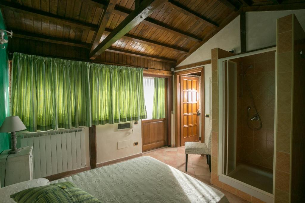 Posteľ alebo postele v izbe v ubytovaní B&B oasi di mamma clara