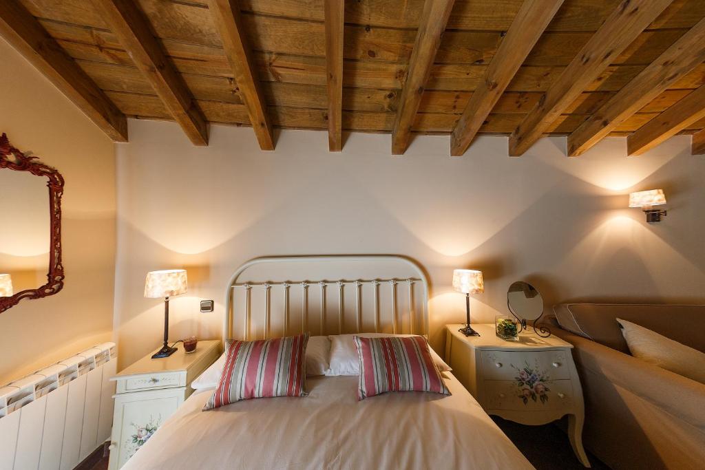 Postel nebo postele na pokoji v ubytování Casa Rural La Galana