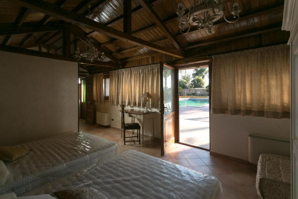Posteľ alebo postele v izbe v ubytovaní B&B oasi di mamma clara