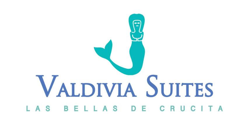 logotipo de una clínica veterinaria con cepillo de dientes en Valdivia Suites, en Crucita