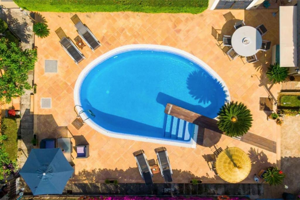 Bazén v ubytování Finca Son Macia, amplia piscina, jardines en Selva, cerca de playas nebo v jeho okolí