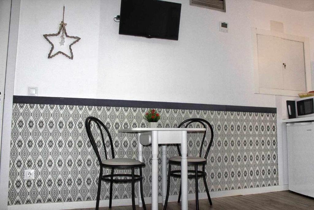A kitchen or kitchenette at Moderno apartamento en el corazón de Madrid Sol