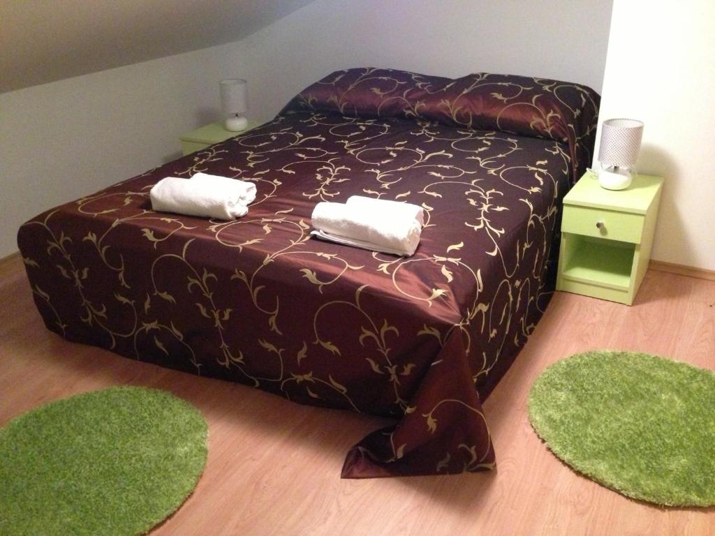 Кровать или кровати в номере Apartmani Milenij