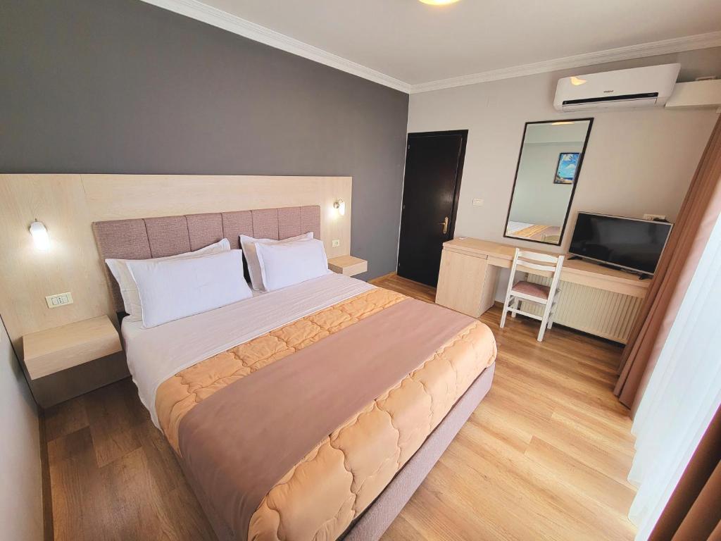 Voodi või voodid majutusasutuse Hotel Enkelana toas