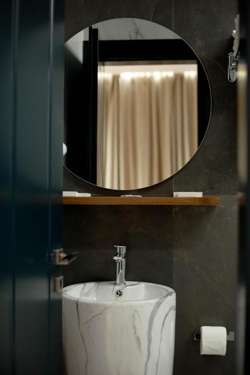 Koupelna v ubytování Mergan Hotel