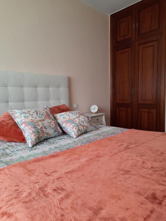 A bed or beds in a room at A CASA DE TOXO