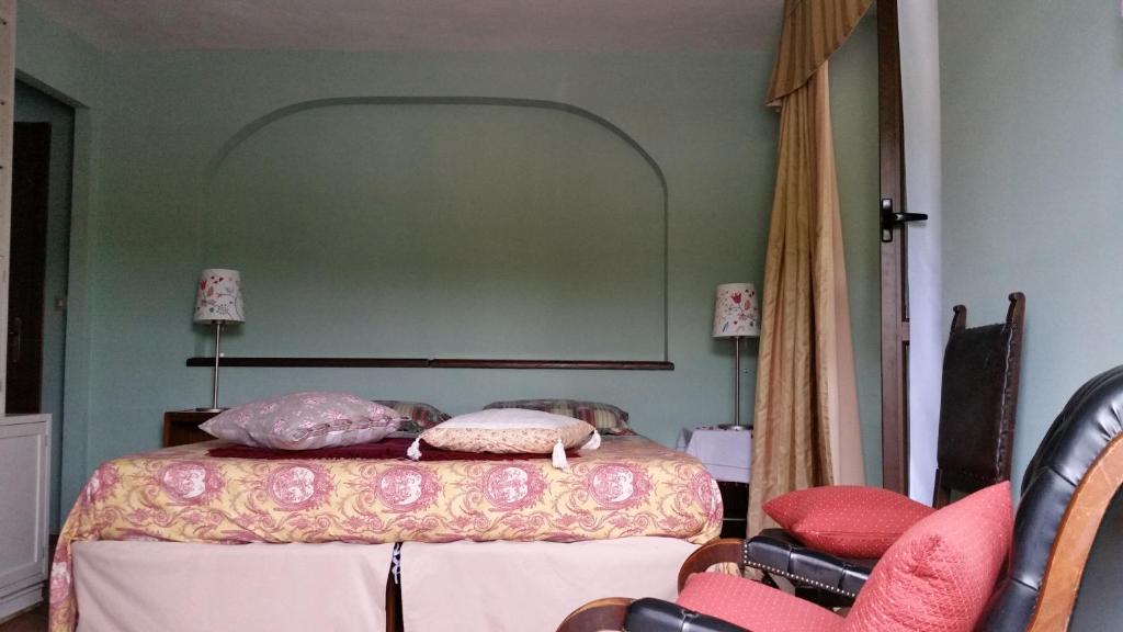 Postel nebo postele na pokoji v ubytování B&B il Baciass