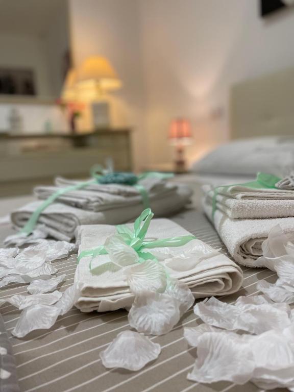 Postel nebo postele na pokoji v ubytování B&B Le Colombine