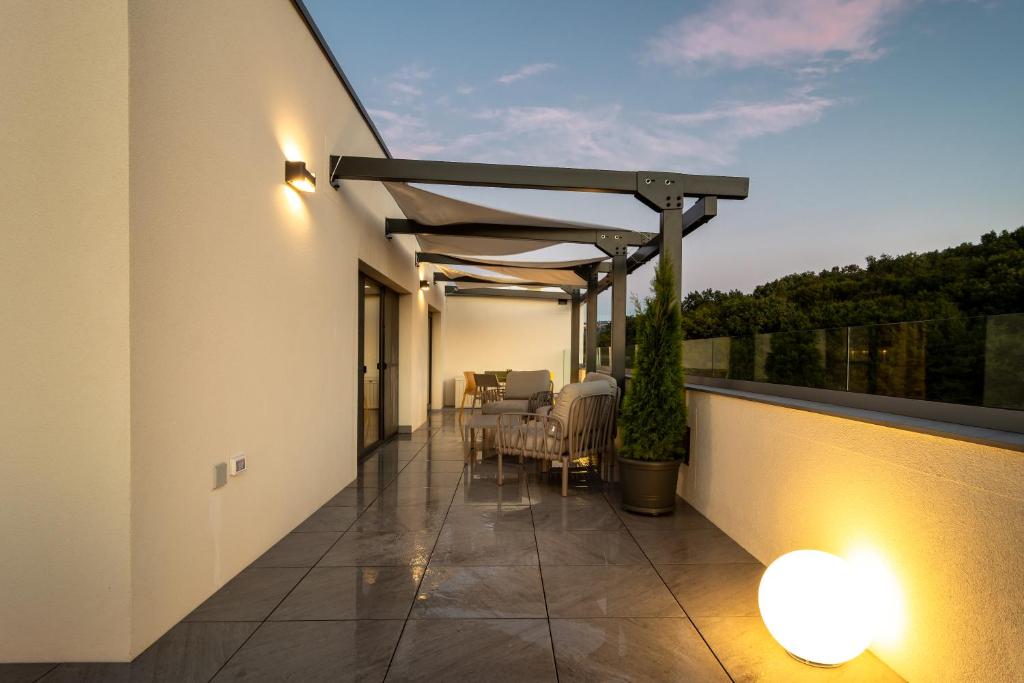 Aparthotel NOX - Resim 6