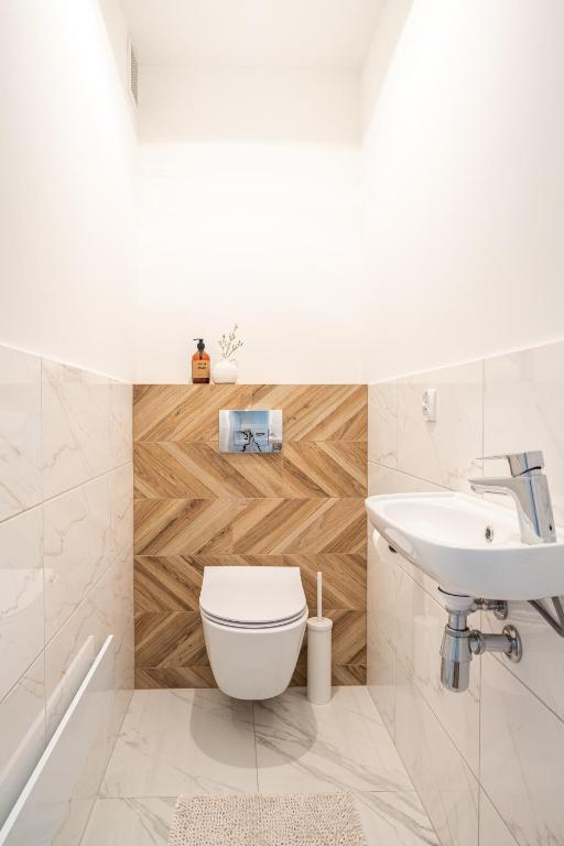Kúpeľňa v ubytovaní Prestige Apartamenty Za Cieszynianką 1D