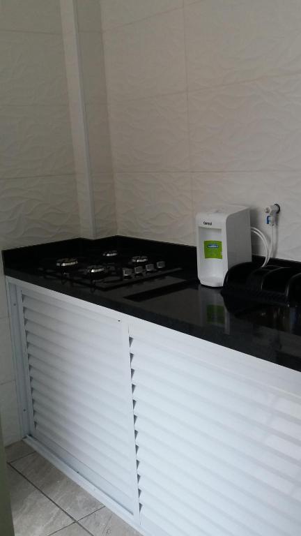 Kuchyň nebo kuchyňský kout v ubytování Cello´s Apartamento