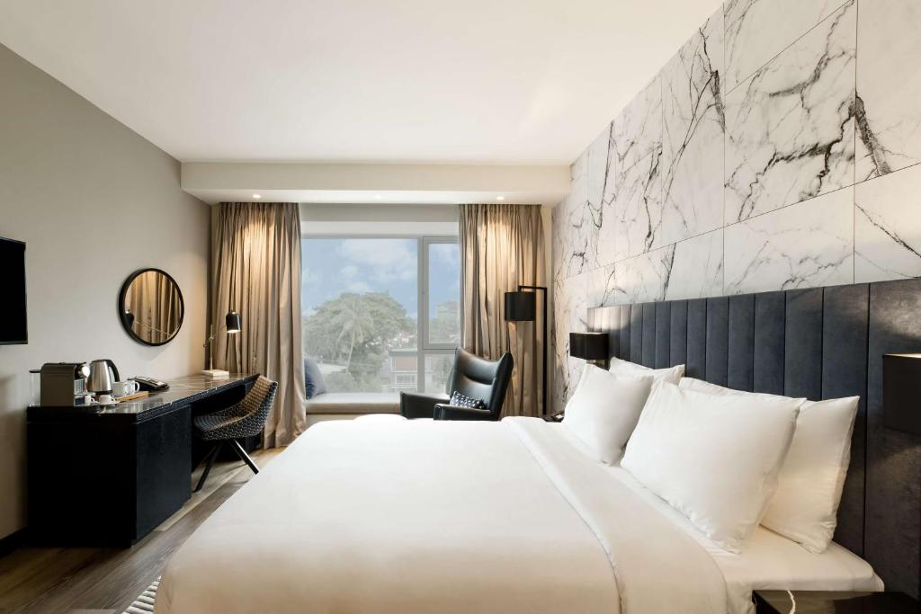 Posteľ alebo postele v izbe v ubytovaní Radisson Blu Anchorage Hotel