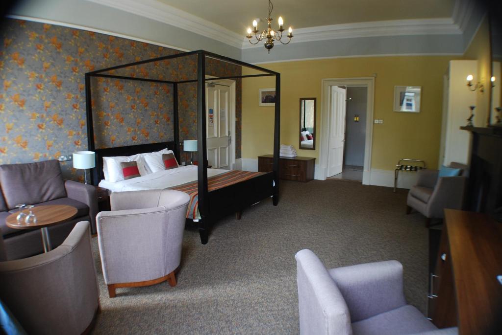Postel nebo postele na pokoji v ubytování The Salisbury Hotel