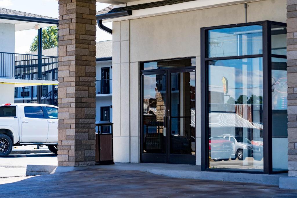 a store front with a revolving door on a street at Stay Express Inn Chattanooga in Chattanooga