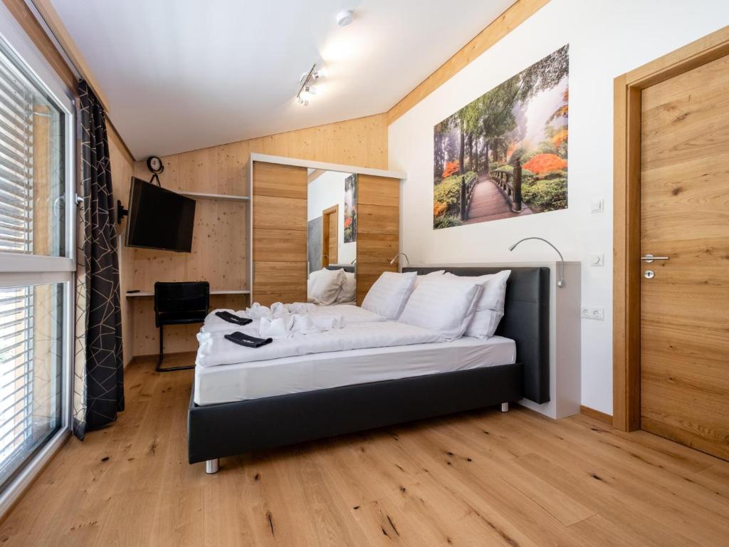 Postel nebo postele na pokoji v ubytování Haus Estelle