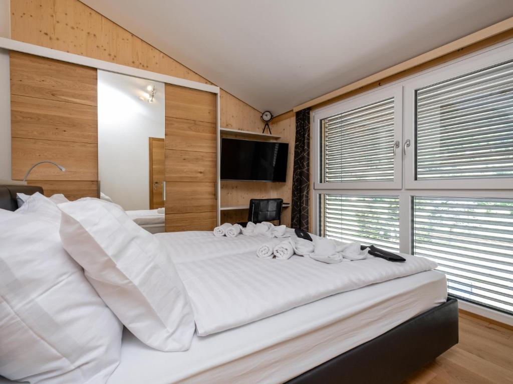 Postel nebo postele na pokoji v ubytování Haus Estelle