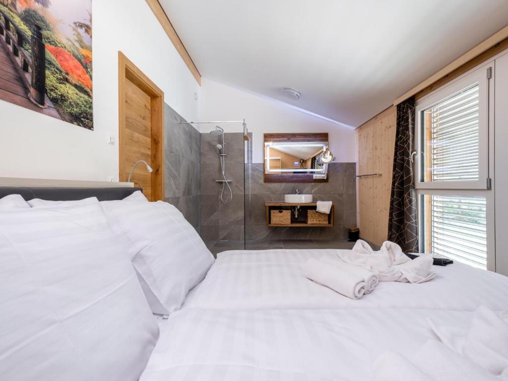 Postel nebo postele na pokoji v ubytování Haus Estelle