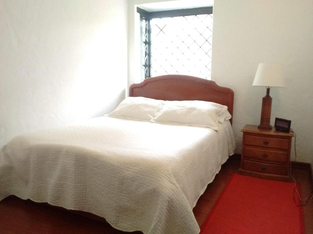 Postel nebo postele na pokoji v ubytování Casa Turística Camitas Inn