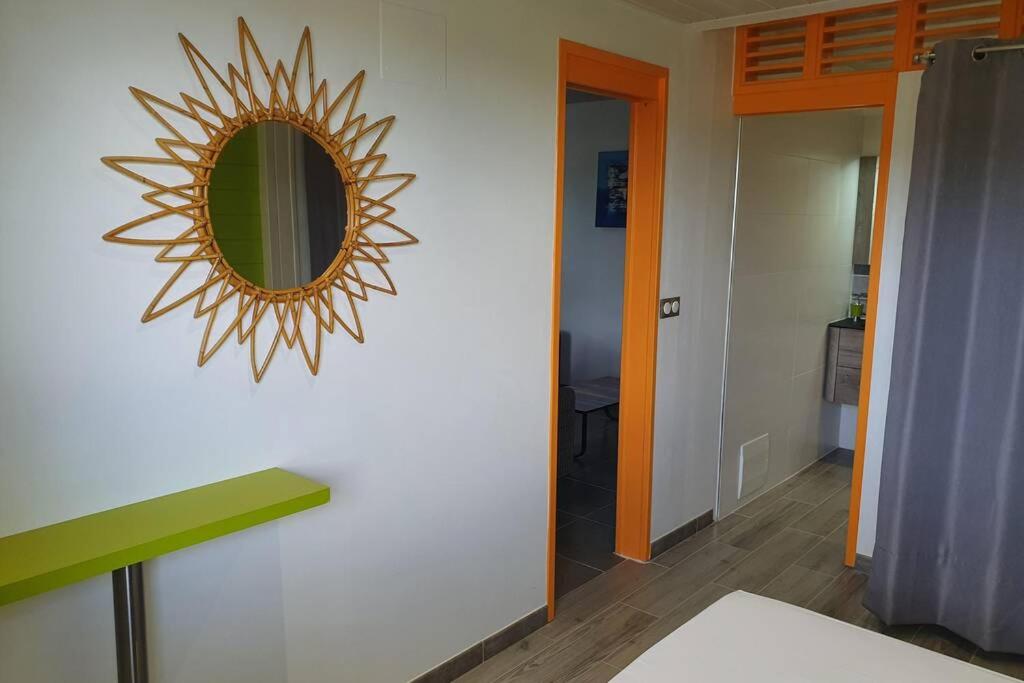 Postel nebo postele na pokoji v ubytování Petit Refuge