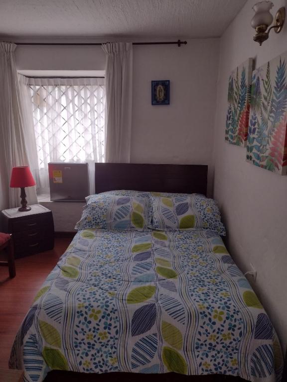Postel nebo postele na pokoji v ubytování Casa Turística Camitas Inn