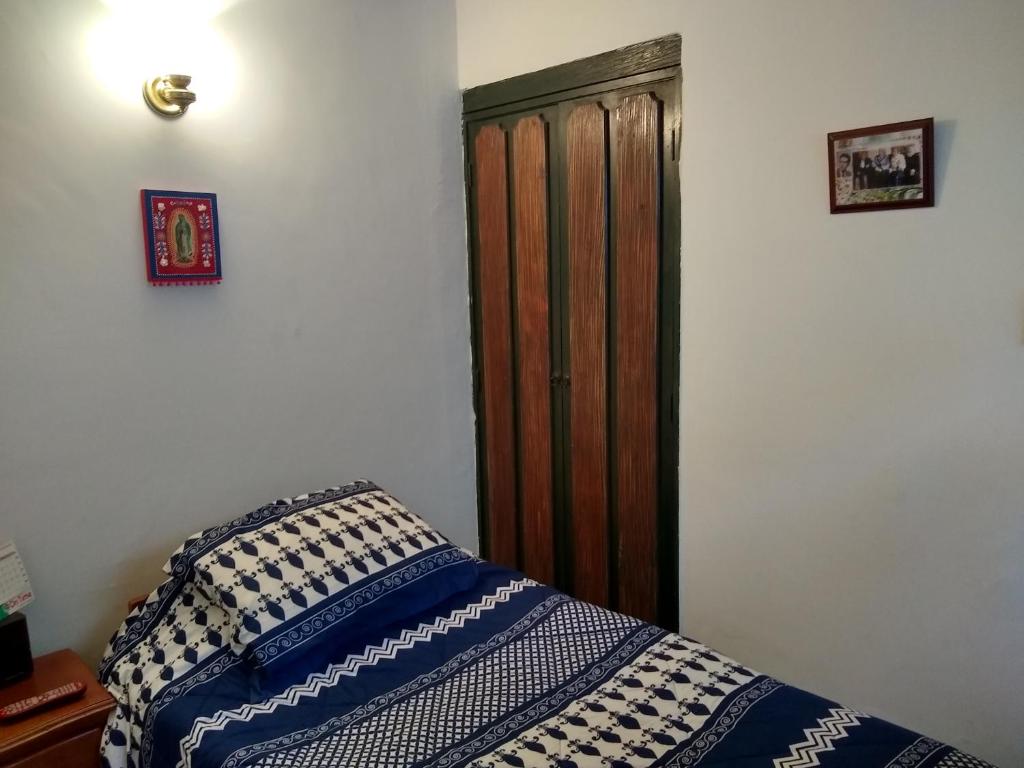 Postel nebo postele na pokoji v ubytování Casa Turística Camitas Inn