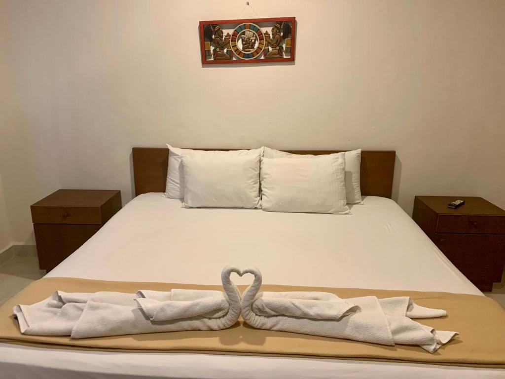 Säng eller sängar i ett rum på AKBAL Playa - Beach Zone