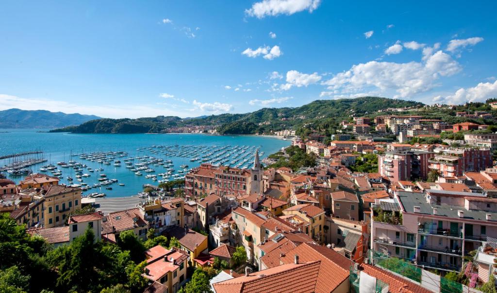 a view of a city with boats in the water at Doria Park Hotel in Lerici