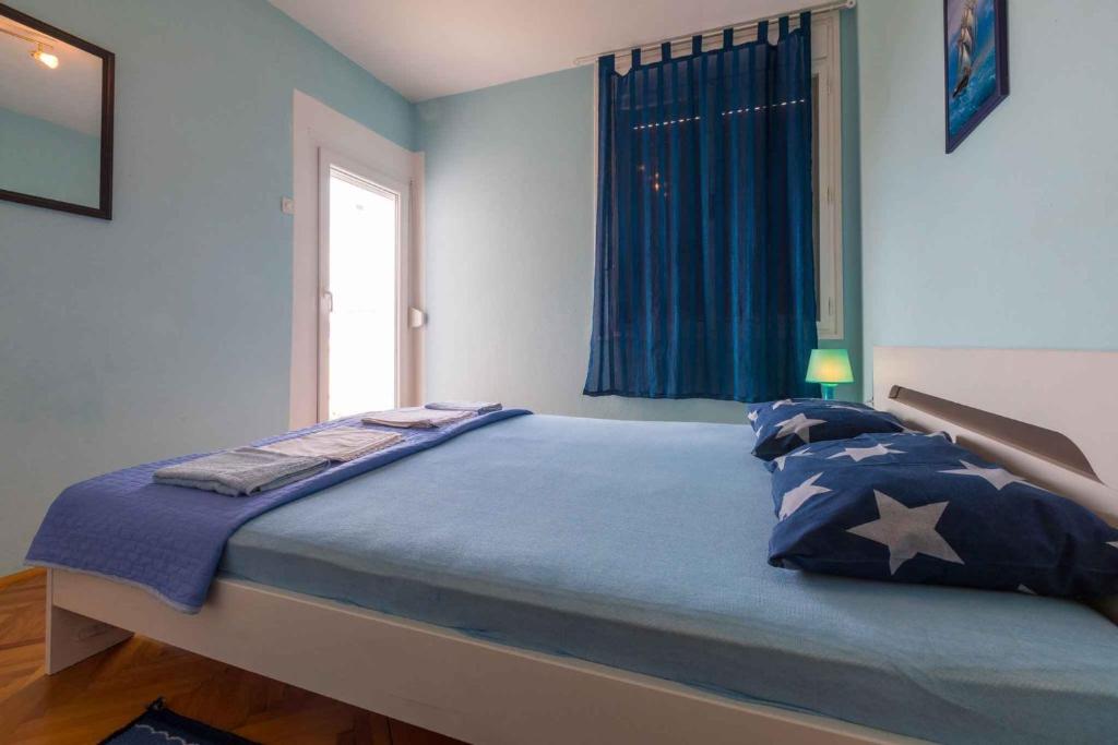 Posteľ alebo postele v izbe v ubytovaní Apartment in Crikvenica 5611