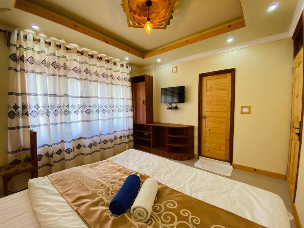 Postel nebo postele na pokoji v ubytování Mariana Maldives