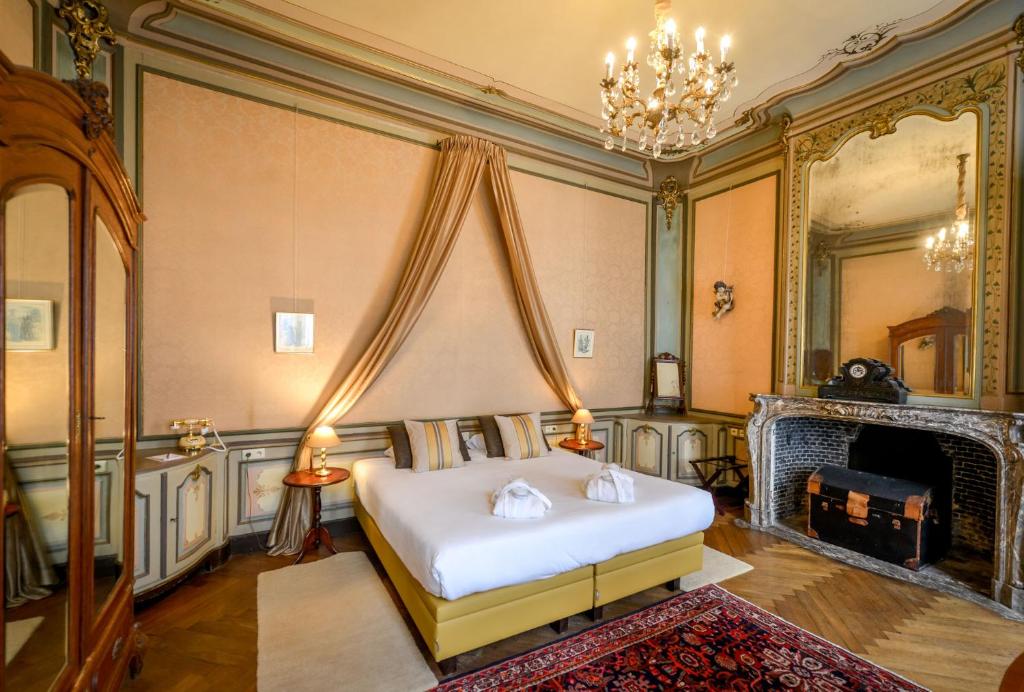 Postel nebo postele na pokoji v ubytování Hotel Jan Brito