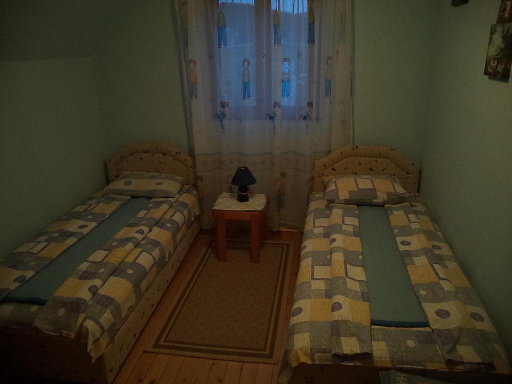 Postel nebo postele na pokoji v ubytování Apartments Zekovic