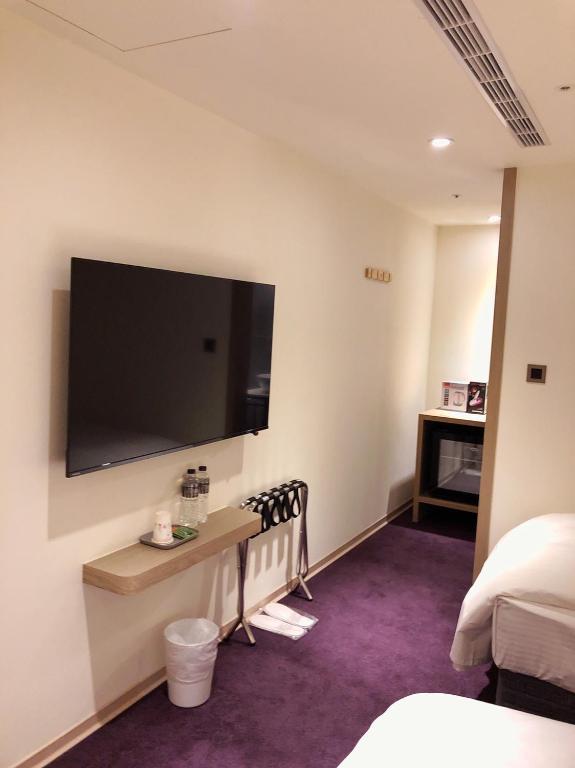 TV a/nebo společenská místnost v ubytování Michi Hotel - Luodong