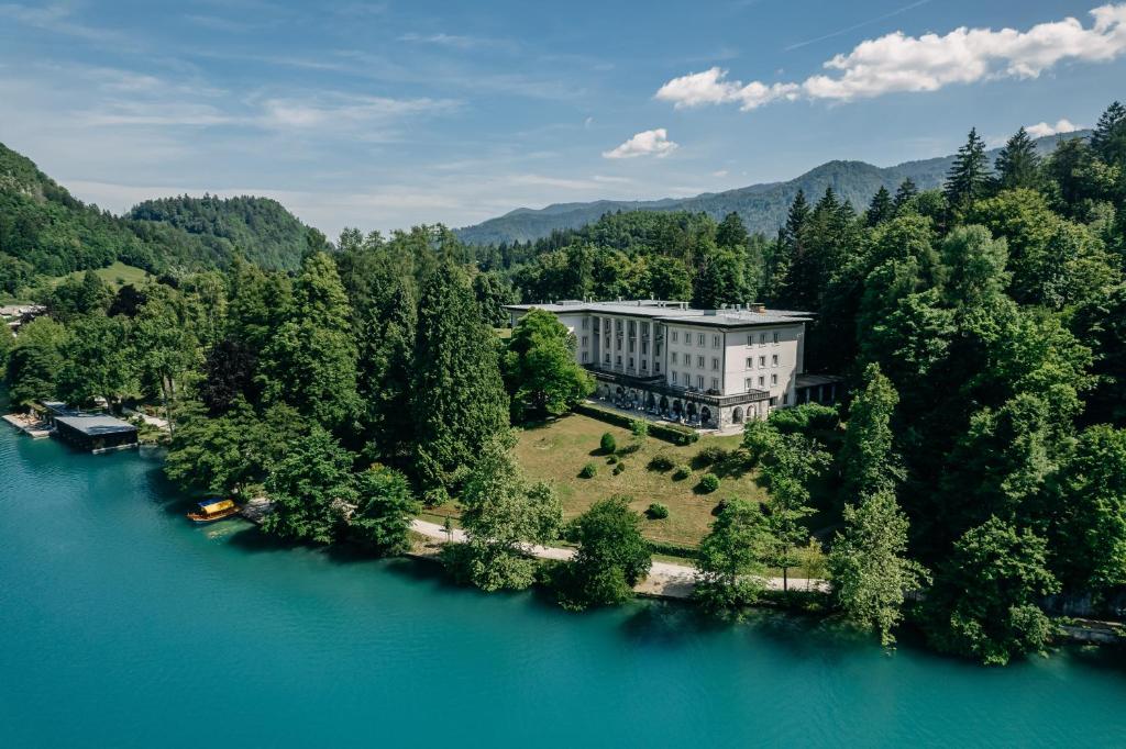 an aerial view of a building on an island in a river at Vila Bled in Bled