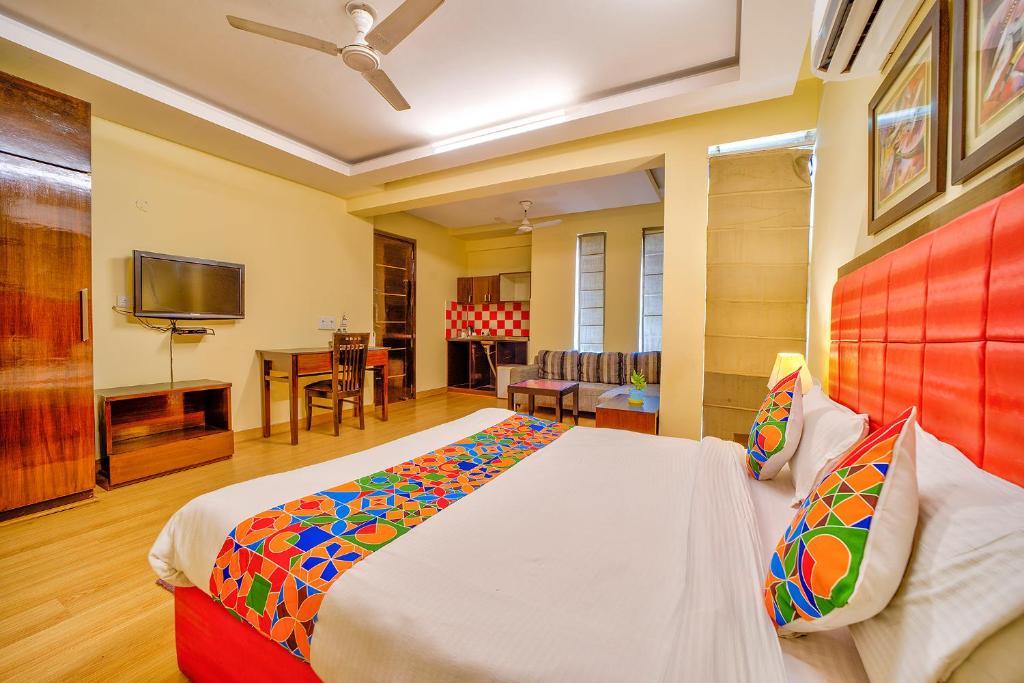 Postel nebo postele na pokoji v ubytování FabHotel Rivlet