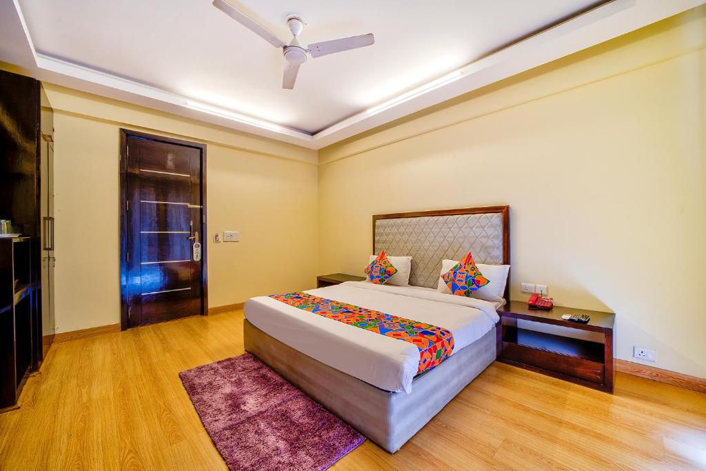 Postel nebo postele na pokoji v ubytování FabHotel Rivlet