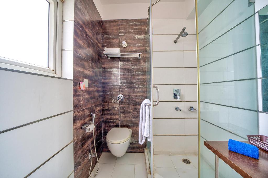 Koupelna v ubytování FabHotel Rivlet