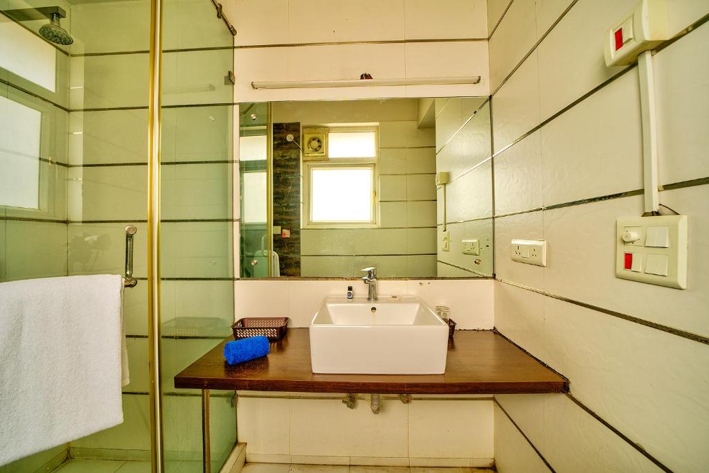 Koupelna v ubytování FabHotel Rivlet