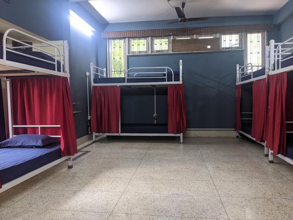 Postel nebo postele na pokoji v ubytování Mezenga Backpackers