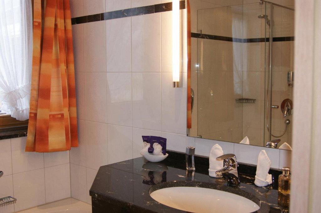 Koupelna v ubytování Hotel Landhaus Feldmeier ***S