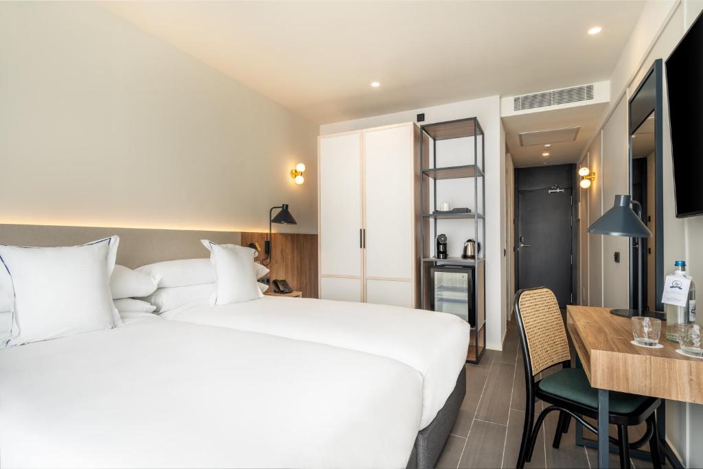 Postel nebo postele na pokoji v ubytování Hotel LIVVO Lumm