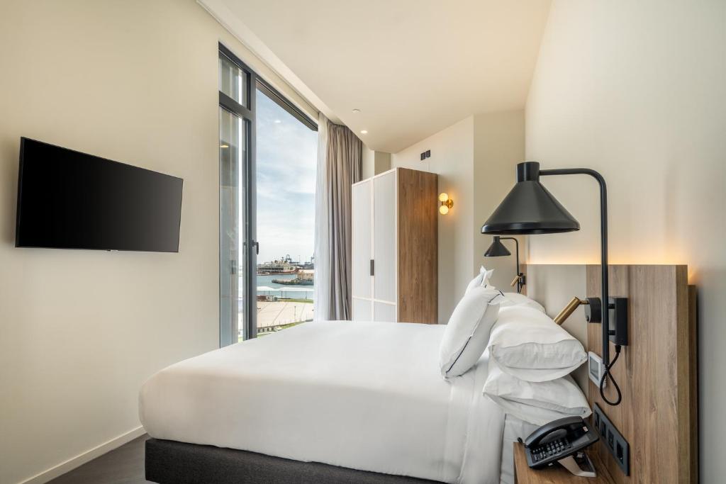TV a/nebo společenská místnost v ubytování Hotel LIVVO Lumm
