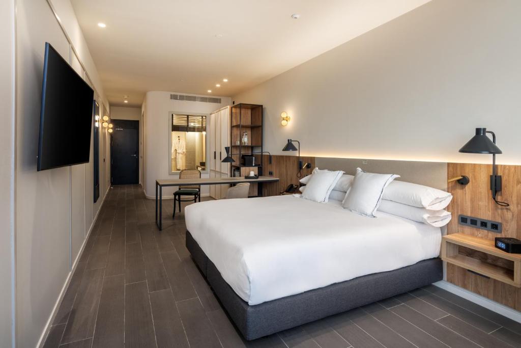 Postel nebo postele na pokoji v ubytování Hotel LIVVO Lumm
