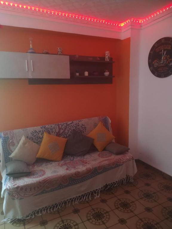 A seating area at Apartamento Lulu