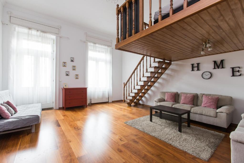 Posedenie v ubytovaní Grand Boulvard Apartment