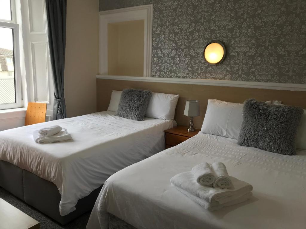 Letto o letti in una camera di DunMoore Guesthouse