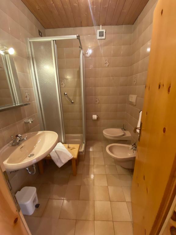 Koupelna v ubytování Hotel Garni LIVING