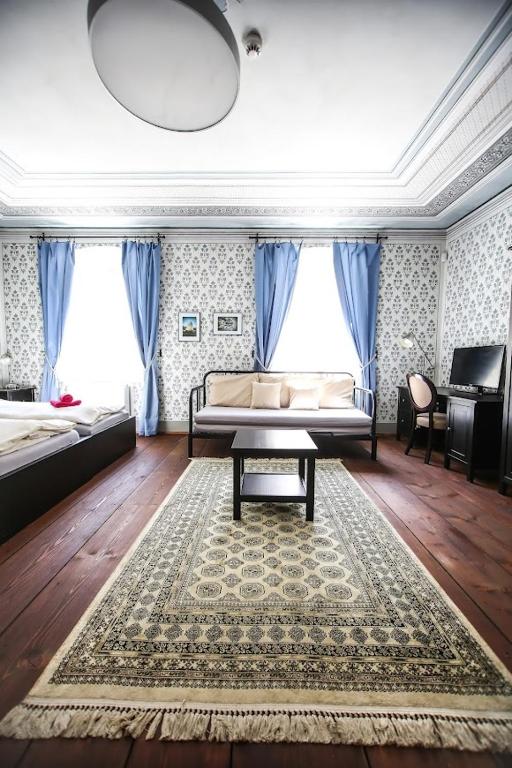 Posteľ alebo postele v izbe v ubytovaní Klášterní apartmány